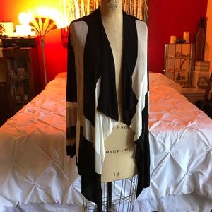 Light wrap. Geometric cardigan. Sweater.